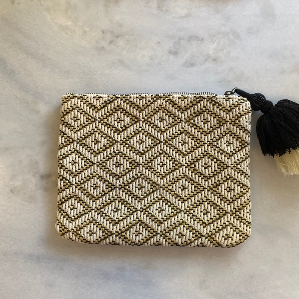 Universal thread black gold and cream clutch